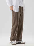 Wide-Leg Pleated Trousers for Versatile Everyday Comfort