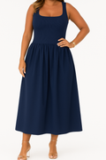 Elegant Flared Midi Dress with Convenient Pockets – Sophia