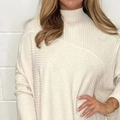 Stylish Knit Sweater with Unique Hemline Detail – Olivia
